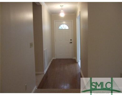 Other. Foyer with hardwood flooring.
