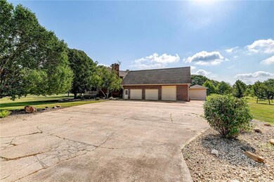 Oversized 3 car garage.  Doors are 9x9 & 2- 9x7' doors