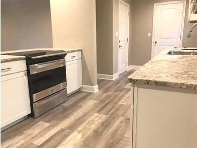 New stainless steel oven with glass top stove