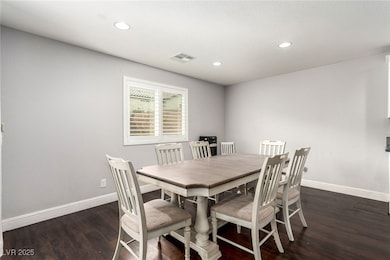 Dining room with recessed lighting, wood finished