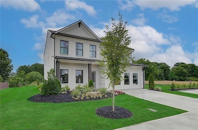 View of front of property featuring a front yard, 