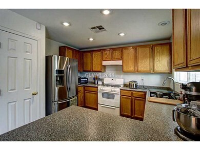 Kitchen. Large walk in pantry and oak cabinets in