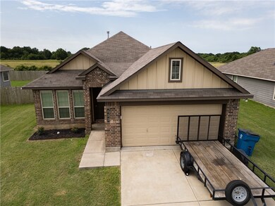 View of front of property featuring brick siding a