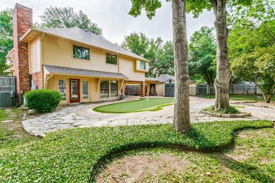 View of front facade featuring french doors and a patio