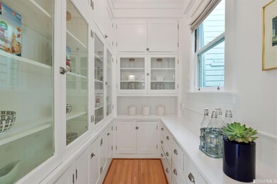 The gourmet kitchen boasts a huge, walk-in pantry 
