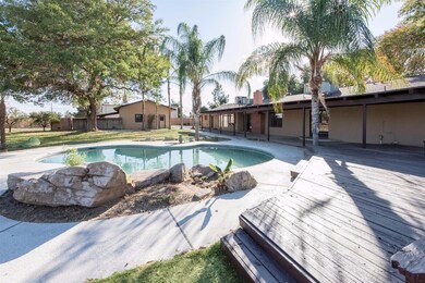 The backyard is just too kool. HUGE covered patio,