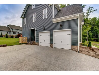 Entrance from driveway into mudroom.  Of course, t