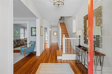 Large entrance hall - gorgeous heart-of-pine floors throughout