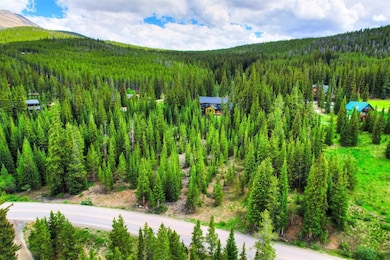 Birds eye view of property featuring a mountain vi