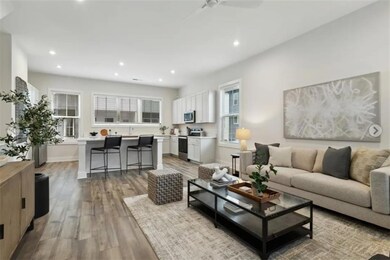 Living room featuring a healthy amount of sunlight