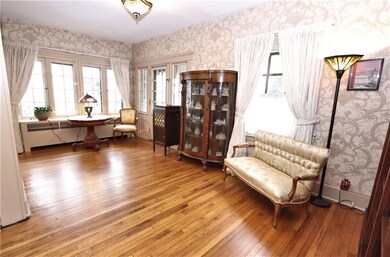 Grand entry with door to Front porch & side door t