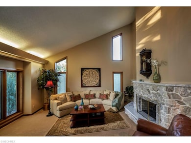 Living room with 2 sided marble fireplace