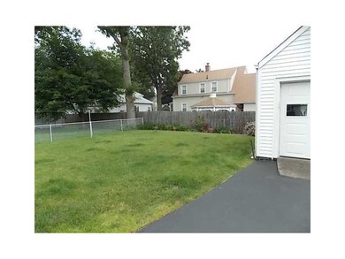 Exterior Back. Lovely backyard with perennial/annu