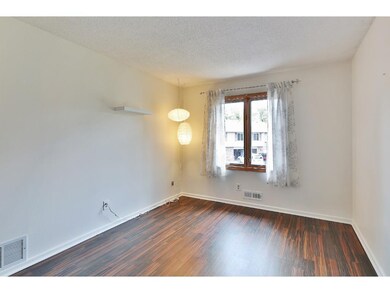 The second bedroom has a double closet with wire s