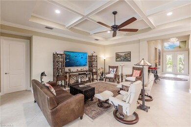 You will be drawn into this home through the wide foyer entry.  My wife looks for an unobstructed view from the front door all the way through to the pool before she goes any further in a home search.  This home passes the test!