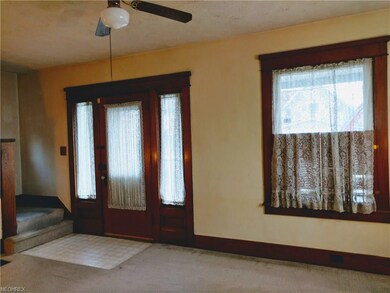 Lovely wood trimmed doors & windows