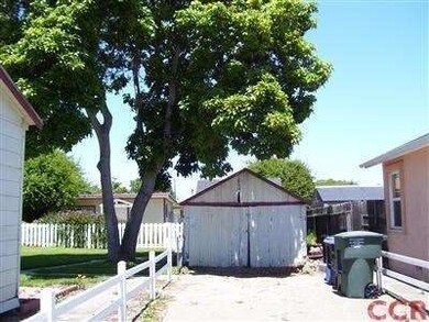 Old garage that is used by the front tenant for st