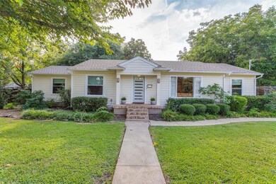 Striking Curb Appeal and Beautiful Landscaping