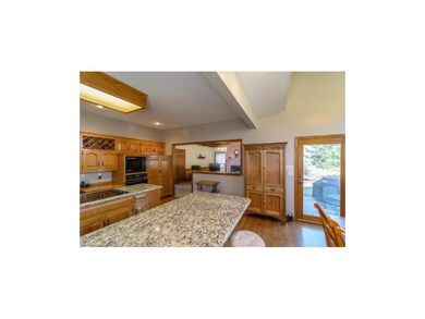 Kitchen is open into large family room.