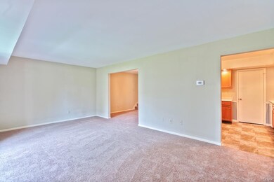 Living room conveniently located to kitchen and di
