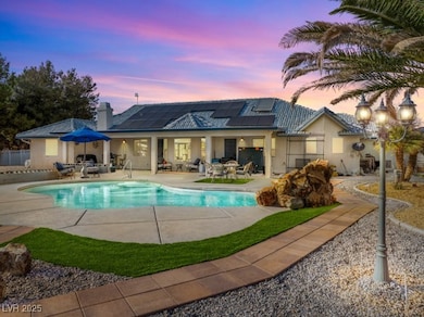 Outdoor pool with outdoor dining space and a patio