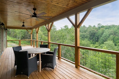 Expansive covered back deck to take in the mountain views