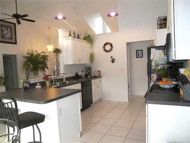 Kitchen Oodles of cabinets and lots of counter spa