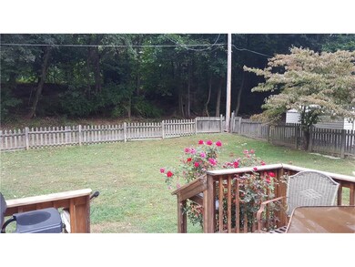 Fenced in back yard and deck