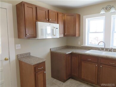 Kitchen. Door to the left leads you to enclosed si