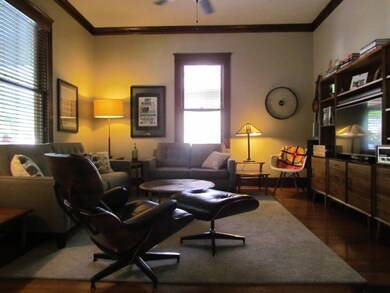 The living room is warm and inviting, and offers o