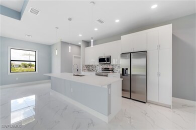 Kitchen with stainless steel appliances, tasteful