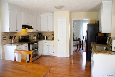 Upgraded Kitchen with Brand New Hardwood Floors.
