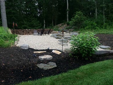Exterior Front. Step up to the New Fire Pit area i