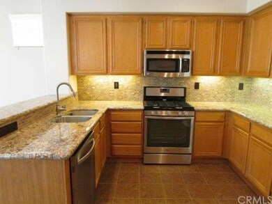 Stainless steel appliances accent this beautiful k