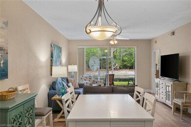 Dining space with ceiling fan, visible vents, and 