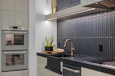 Kitchen featuring appliances with stainless steel