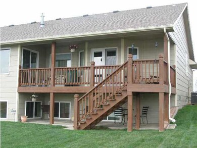 24' covered back deck with gorgeous views of the l