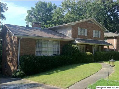 Notice the bow window in the living room.