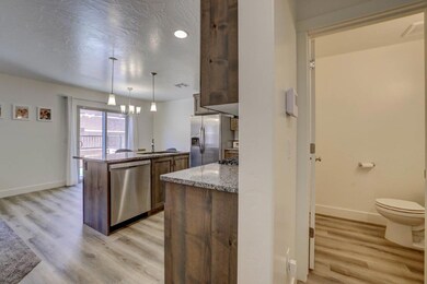 Entrance to Half Bathroom & Kitchen