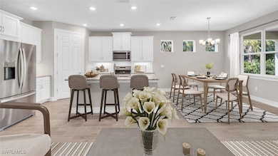 Dining room featuring light wood-type flooring, re