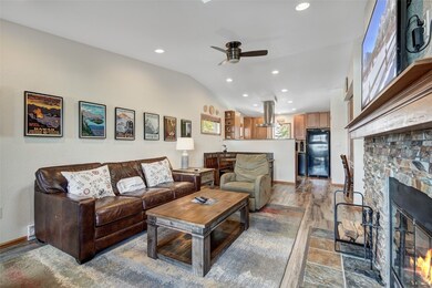 Living area with wood finished floors, baseboards,
