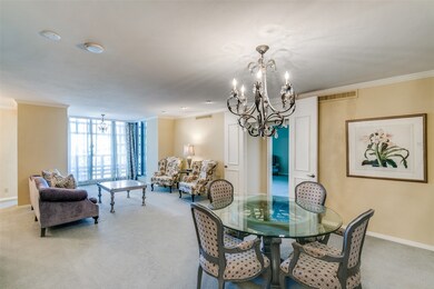Dining room featuring ornamental molding, a notable chandelier, and visible vents