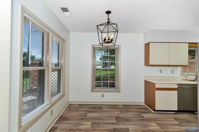 Quite breakfast nook with bright sunny windows!