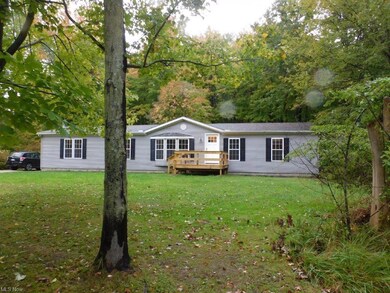 View of front of property featuring a front yard a