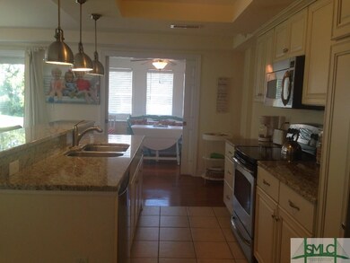 Granite countertops and stainless appliances in th