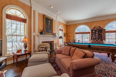 great room with wood burning fireplace