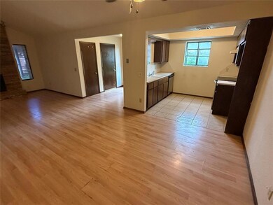 Kitchen featuring light countertops, light wood-st