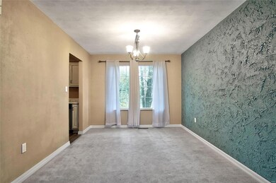 Modern lighting and textured focal wall.