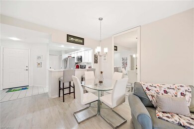 Dining area featuring light wood finished floors a
