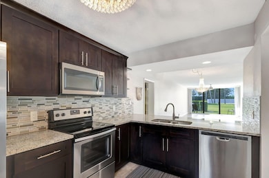 2741 Village Blvd unit 1040, West Palm Beach, FL 33409 - photo 2